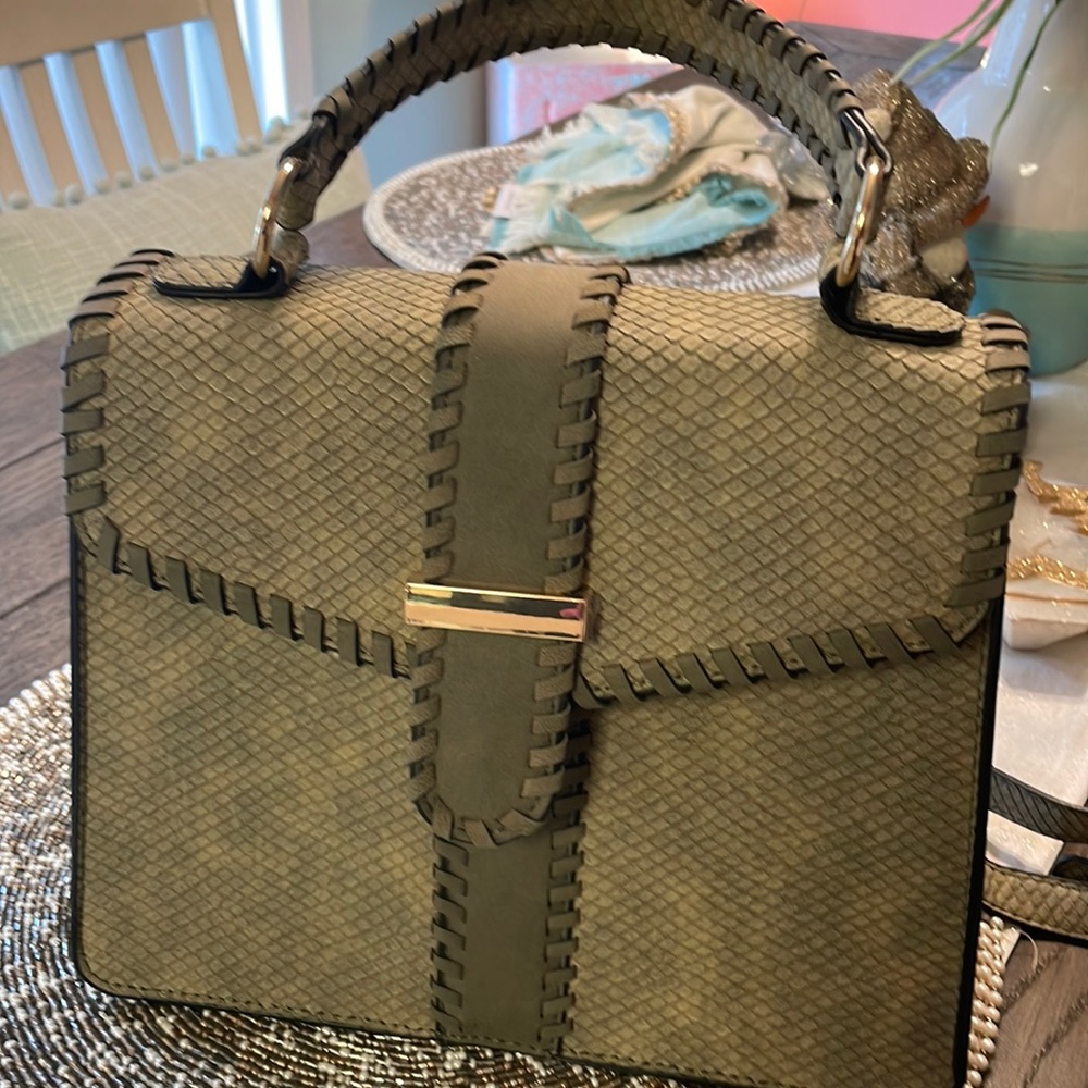 Army green,6 months old,no brand,boutique purchase..crossbody purse..never used.